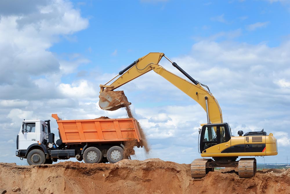 Excavator Loading Sand in Mackay — MDD Heavy Industries