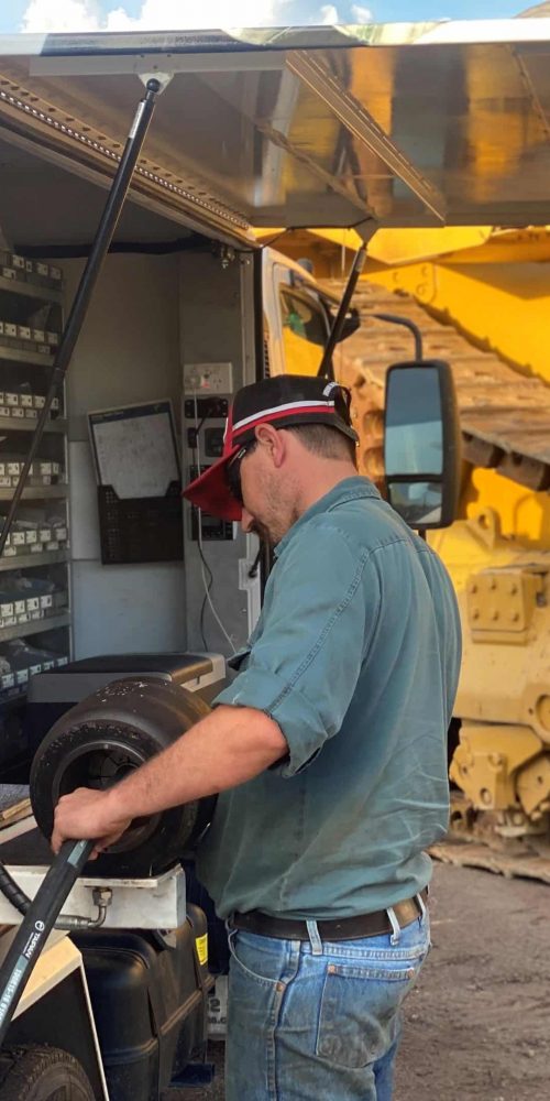 Man With Service Truck — MDD Heavy Industries in Eton, QLD